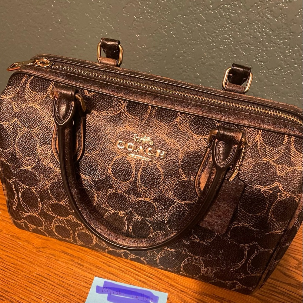 COACH Signature loved Canvas medium Rowan